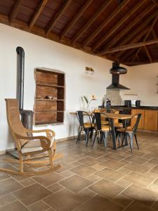 a dining room with a table and chairs at Casa Gecko in Tijarafe