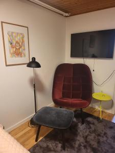 Μια τηλεόραση ή/και κέντρο ψυχαγωγίας στο Cozy Central House Stay Kalundborg