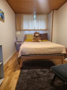 Ένα ή περισσότερα κρεβάτια σε δωμάτιο στο Cozy Central House Stay Kalundborg