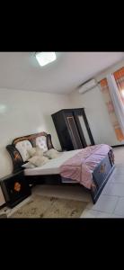 Ένα ή περισσότερα κρεβάτια σε δωμάτιο στο Océan +2 φωτογραφίες