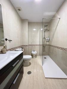 Koupelna v ubytování Encantador y céntrico piso con garaje