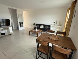 TV a/nebo společenská místnost v ubytování Victoria Plaza