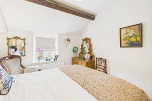 Ένα ή περισσότερα κρεβάτια σε δωμάτιο στο The White Lion