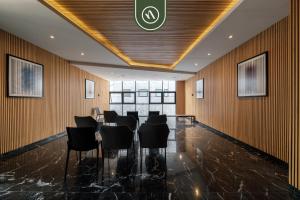 Et opholdsområde på Centric 2 BR Condo - Gym - Open Air Cinema