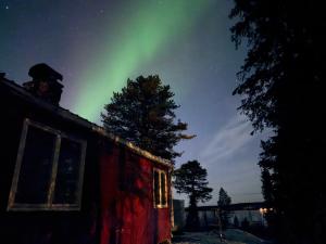 Φωτογραφία από το άλμπουμ του Aurora Lakeside Cabin Altajärvi σε Kiruna