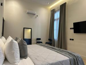 TV a/nebo společenská místnost v ubytování Hotel Boutique Ubuntu