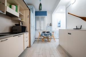 Kuchyň nebo kuchyňský kout v ubytování IM INTERNATIONAL 1 - Galleria Raggio 3/9