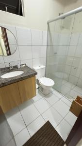 Koupelna v ubytování Residencial Nova Taíba CE com vista para o mar