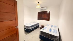 Postel nebo postele na pokoji v ubytování Casa 123 Milagres - Casa em São Miguel dos Milagres, Alagoas