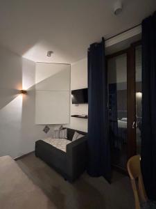 a bedroom with a bed and a large mirror at International Naples in Naples