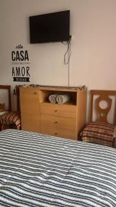 En eller flere senge i et værelse på Mono Ciudad Marítima vista lateral