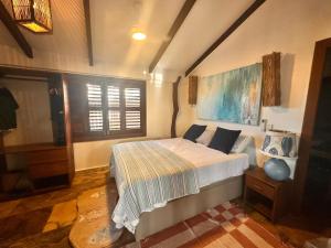 een slaapkamer met een groot bed in een kamer bij Casa nova in Prea