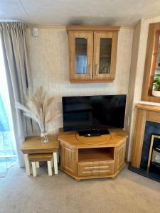 TV a/nebo společenská místnost v ubytování East Coast + 25 fotografií