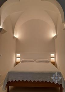 Postel nebo postele na pokoji v ubytování Freedomus