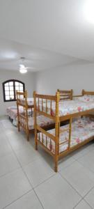 En eller flere senge i et værelse på Mar de Maria Suítes + 33 billeder