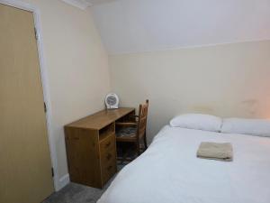 Postel nebo postele na pokoji v ubytování Stay Near Colchester twn centre4