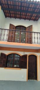 En balkon eller terrasse på Mar de Maria Suítes