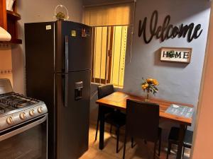 Kuchyň nebo kuchyňský kout v ubytování Depa en el Corazon de la Zona Dorada Y Playa