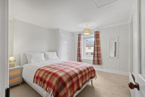 Ένα ή περισσότερα κρεβάτια σε δωμάτιο στο Coria House - North East Escape