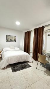 Postel nebo postele na pokoji v ubytování Nogal, cómodo y fresco alojamiento