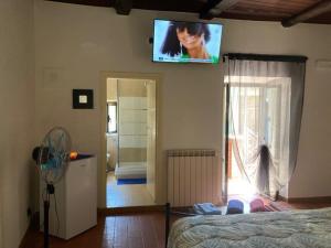 Ένα ή περισσότερα κρεβάτια σε δωμάτιο στο B&B La Suite di Alba