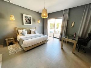 Postel nebo postele na pokoji v ubytování Villa Ines + 10 fotografií