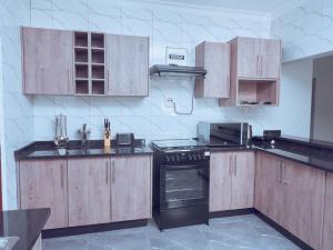 Kuchyň nebo kuchyňský kout v ubytování Rosh Pina Court + 6 fotografií