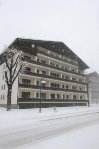 a large apartment building in a snow storm at TinyAlps in Saalbach Hinterglemm
