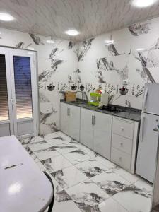 Kuchyň nebo kuchyňský kout v ubytování Villa ziari