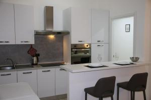 Η κουζίνα ή μικρή κουζίνα στο Melzo INN