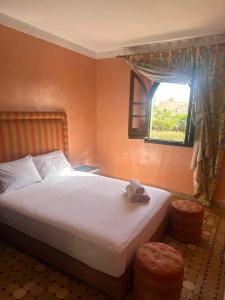 Postel nebo postele na pokoji v ubytování Cosy villa a marrakech