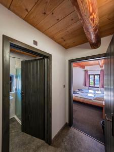 Postel nebo postele na pokoji v ubytování Pivovar Mlýn