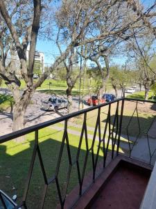 a balcony with a view of a parking lot at La Casa de Oli in Chascomús