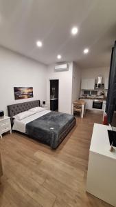 Ένα ή περισσότερα κρεβάτια σε δωμάτιο στο Siciliano Palace - Deluxe Apartments & Spa