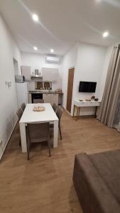 Μια τηλεόραση ή/και κέντρο ψυχαγωγίας στο Siciliano Palace - Deluxe Apartments & Spa