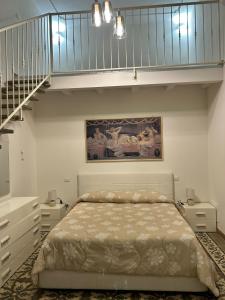 Ένα ή περισσότερα κρεβάτια σε δωμάτιο στο Li Cafari