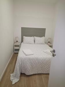 Ένα ή περισσότερα κρεβάτια σε δωμάτιο στο Me&You - Family Beach House