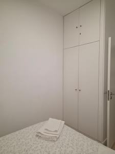 Ένα ή περισσότερα κρεβάτια σε δωμάτιο στο Me&You - Family Beach House