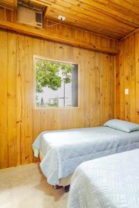 Postel nebo postele na pokoji v ubytování Custo beneficio, conforto, com ar-condicionado e Wi-Fi