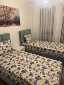 Postel nebo postele na pokoji v ubytování Jardin de Carthage