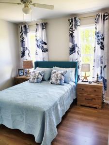 Postel nebo postele na pokoji v ubytování Coral Crest