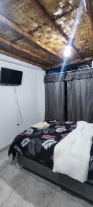 Ένα ή περισσότερα κρεβάτια σε δωμάτιο στο Casa rústica