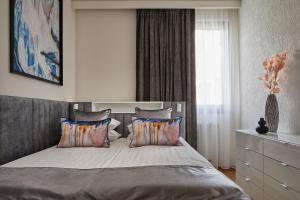 Postel nebo postele na pokoji v ubytování 7Seasons Apartments Budapest