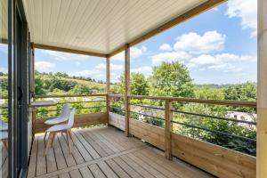 Balkón nebo terasa v ubytování Camping Papillon Bouillon - Vakantiehuis Premium