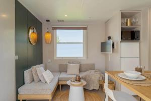 Χώρος καθιστικού στο Camping Papillon Kinrooi - La Casetta