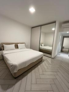 Ένα ή περισσότερα κρεβάτια σε δωμάτιο στο Luxury apartments in Ayla