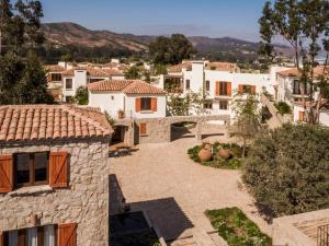 an aerial view of a villa in a village at Casapueblo Rent Cachagua CP 02 in Cachagua