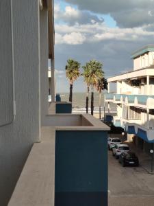a view of the beach from the balcony of a building at Seaview Allegra in Montesilvano