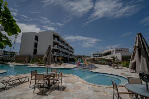 Hồ bơi trong/gần Refúgio Sol e mar Studio Resort em Muro Alto