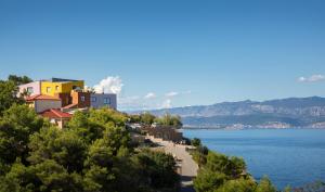 a town on the shore of a body of water at Hotel Vinotel Gospoja in Vrbnik